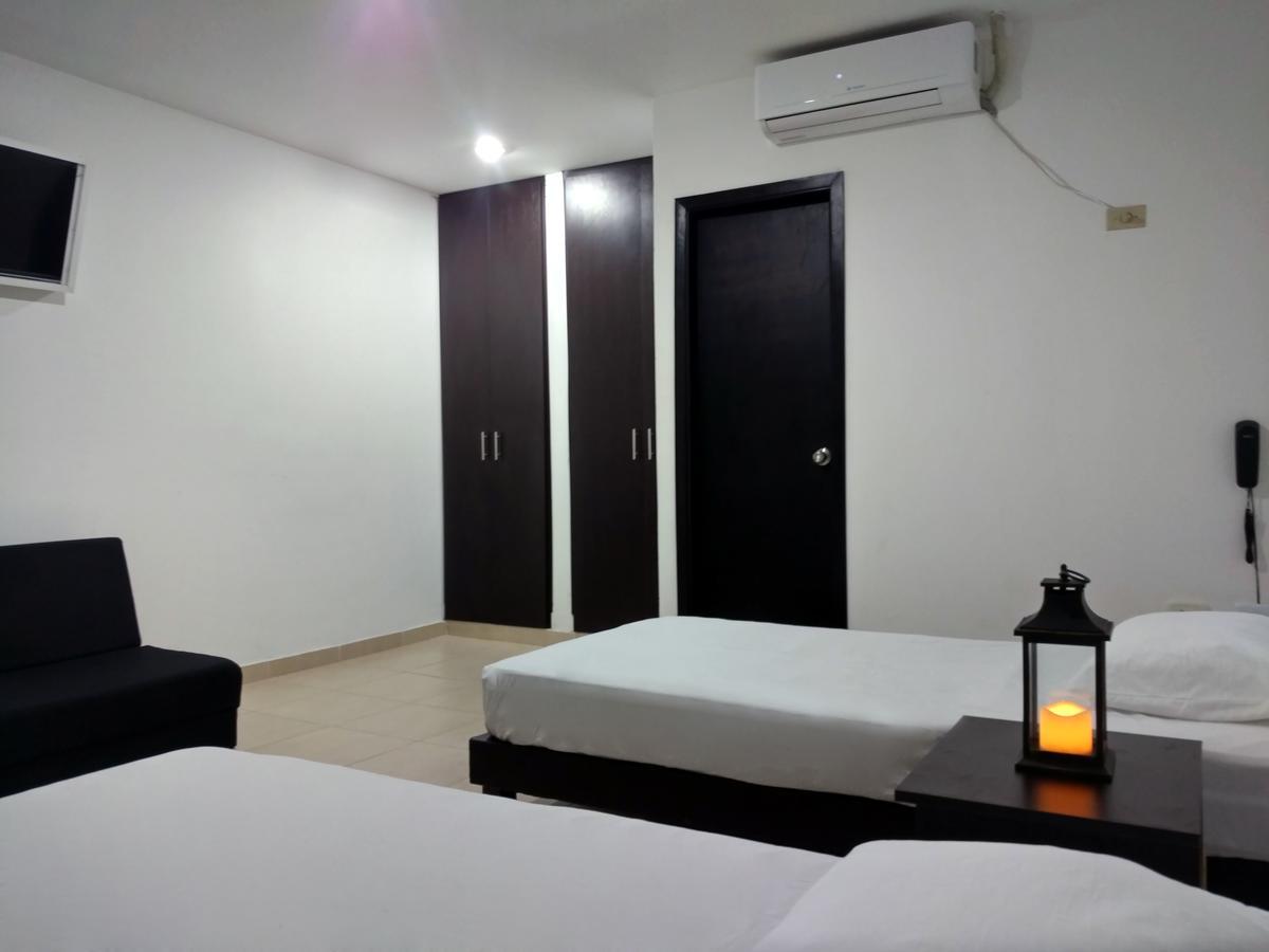 Hotel El Emigrante Puerto Colombia Bagian luar foto