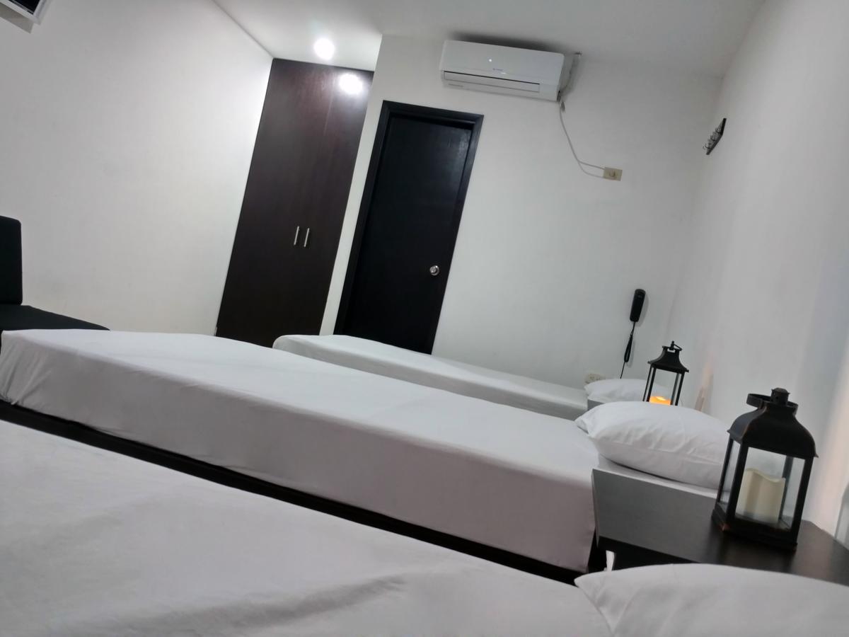Hotel El Emigrante Puerto Colombia Bagian luar foto